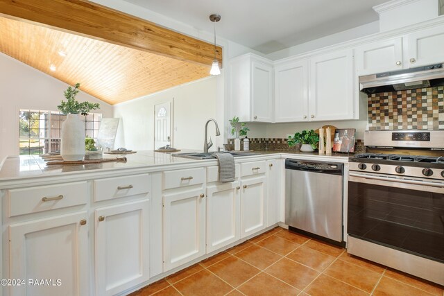 kitchen with white cabinets, stainless steel appliances, vaulted ceiling, and wooden ceiling