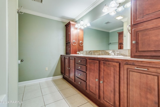 bathroom with tile patterned flooring, vanity, and crown molding