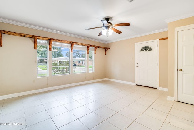 interior space with ceiling fan and crown molding