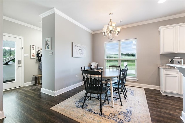 dining room featuring visible vents, baseboards, dark wood-type flooring, an inviting chandelier, and crown molding