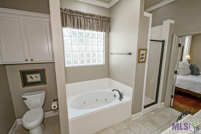 full bath featuring a shower stall, a whirlpool tub, and tile patterned floors