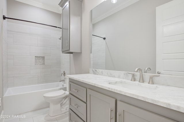 full bathroom with crown molding, tiled shower / bath combo, vanity, and toilet