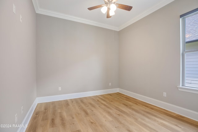 unfurnished room with light hardwood / wood-style flooring, ornamental molding, ceiling fan, and plenty of natural light