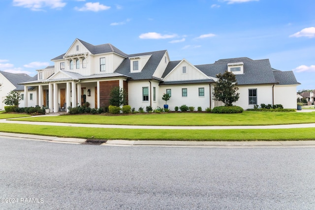 view of front of property with a front lawn