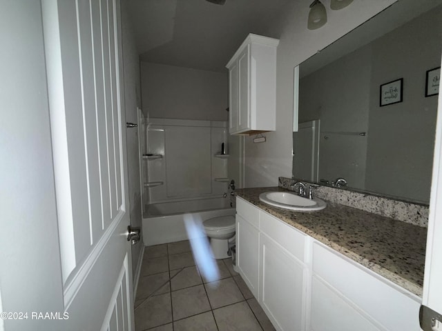 full bathroom featuring toilet, shower / bathing tub combination, vanity, and tile patterned floors