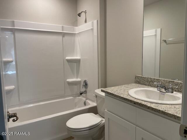 full bathroom featuring shower / bath combination, toilet, and vanity