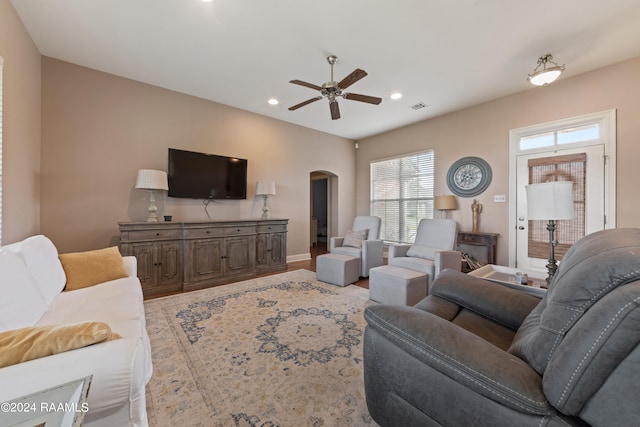 living room featuring ceiling fan