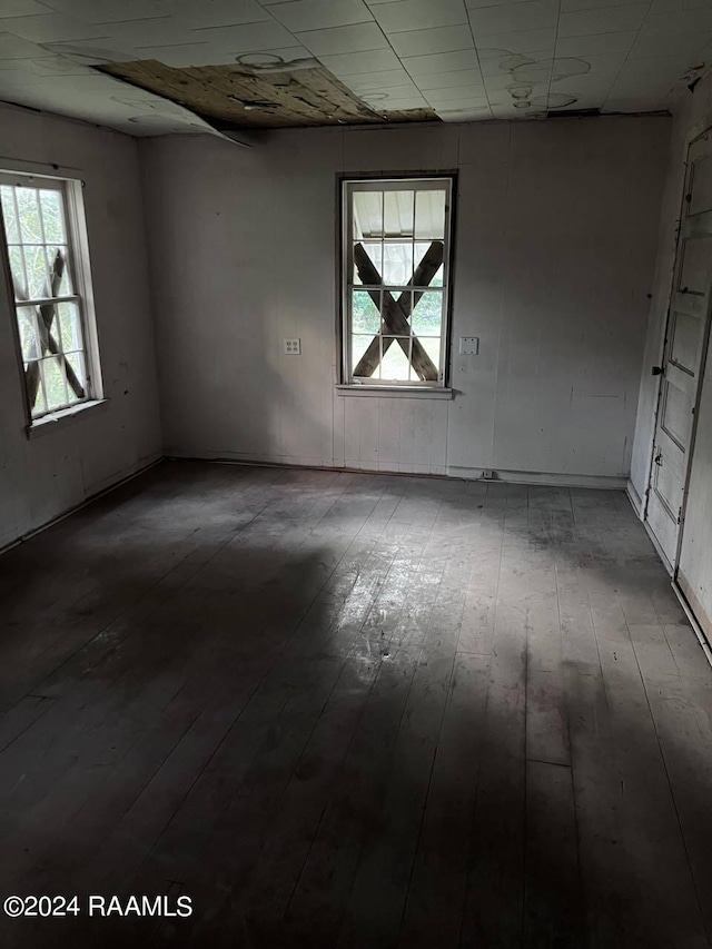 empty room featuring wood-type flooring