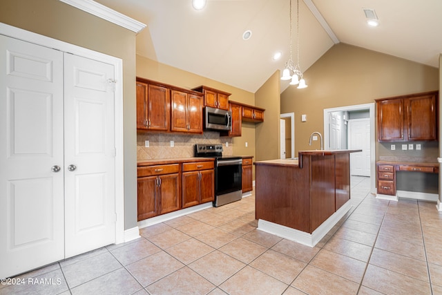 kitchen featuring appliances with stainless steel finishes, decorative light fixtures, high vaulted ceiling, light tile patterned floors, and a kitchen island with sink