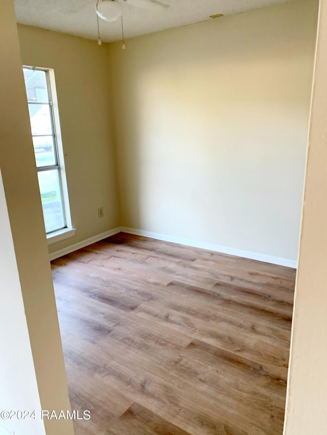 unfurnished room featuring light hardwood / wood-style flooring