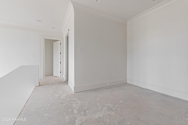 spare room featuring ornamental molding