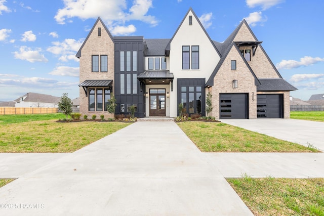 view of front facade with a garage, a front lawn, and french doors