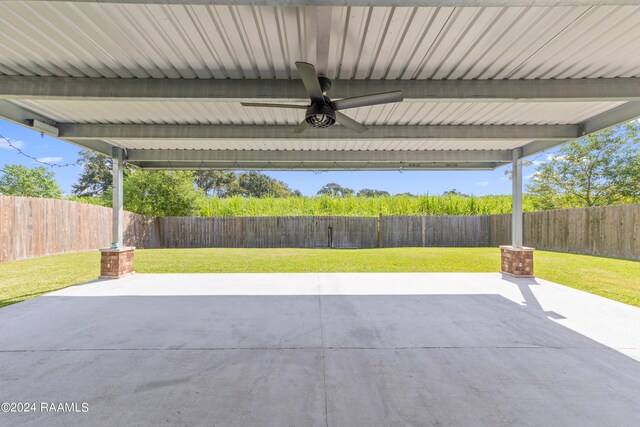 view of patio featuring ceiling fan