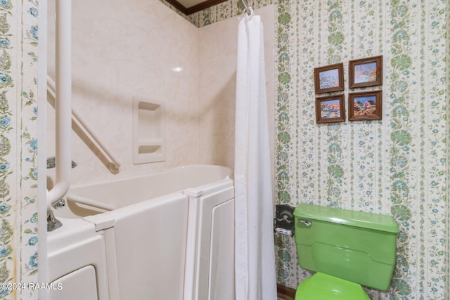 bathroom with toilet and shower / bath combination with curtain