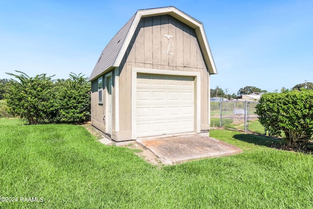 garage with a lawn