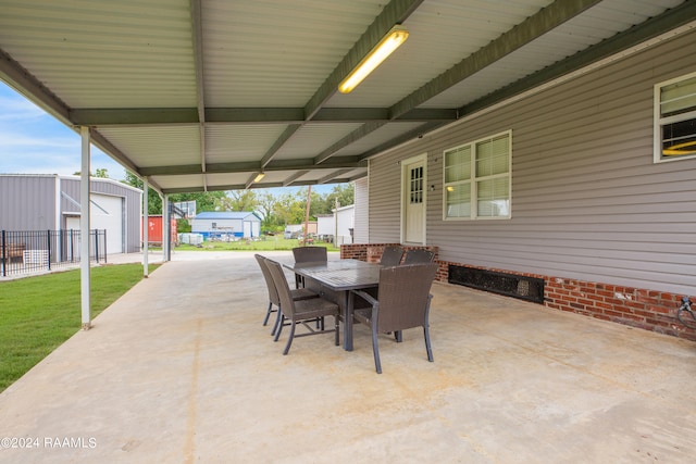 view of patio / terrace featuring an outbuilding