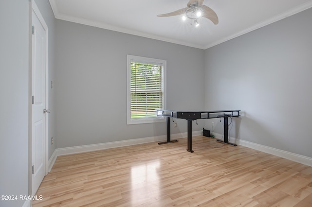 interior space with light wood-type flooring, ornamental molding, and ceiling fan