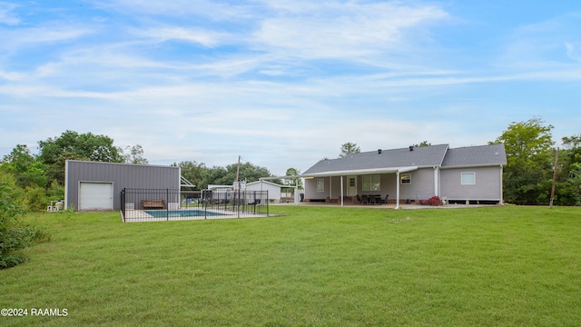 view of yard featuring a patio area and an outbuilding