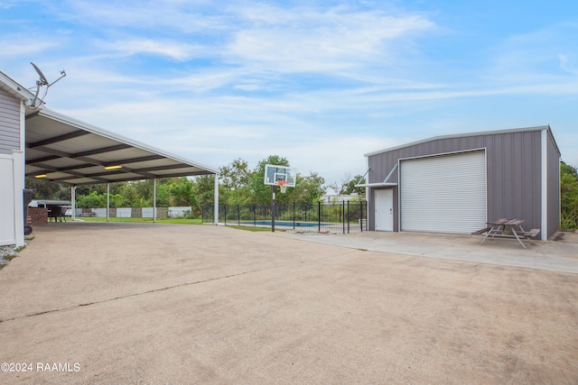 exterior space with an outdoor structure and a garage