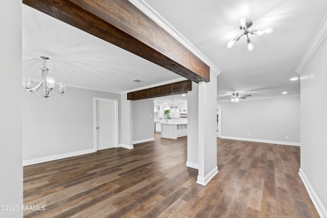 unfurnished living room with ceiling fan with notable chandelier, dark wood-type flooring, and crown molding