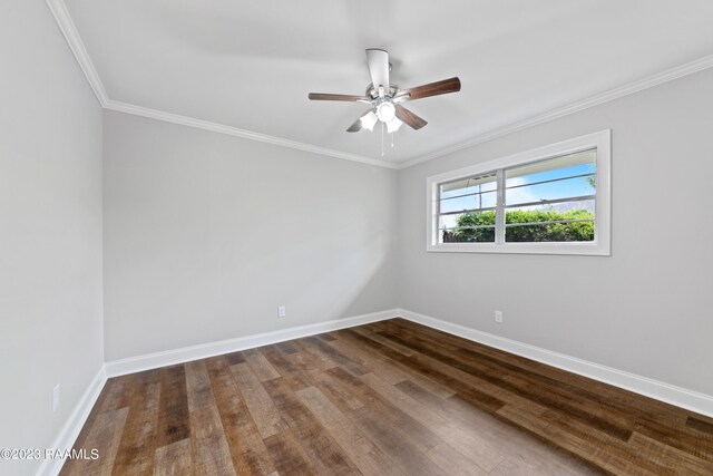 empty room featuring wood-type flooring, ornamental molding, and ceiling fan