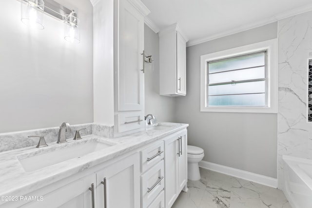 bathroom with vanity, crown molding, toilet, and a washtub