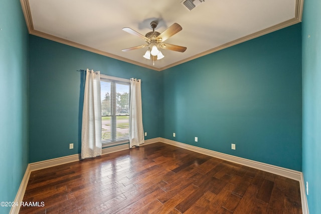 unfurnished room with ornamental molding, ceiling fan, and dark hardwood / wood-style flooring