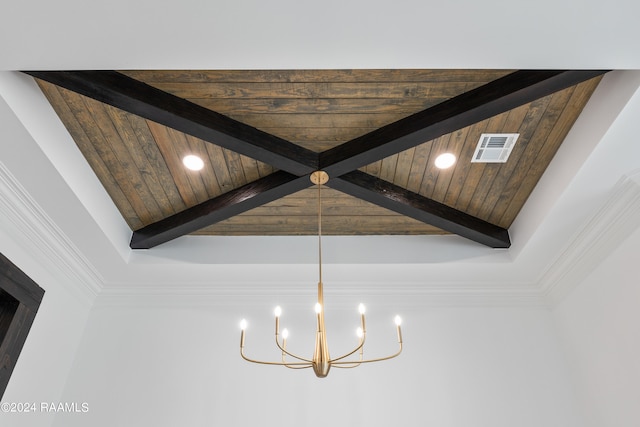 room details featuring wood ceiling, ornamental molding, and beamed ceiling