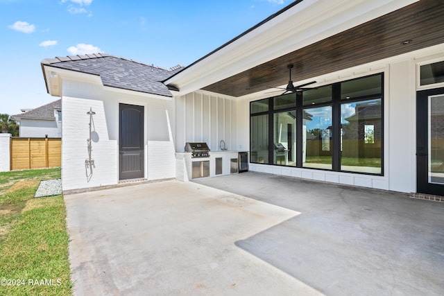 view of patio with ceiling fan