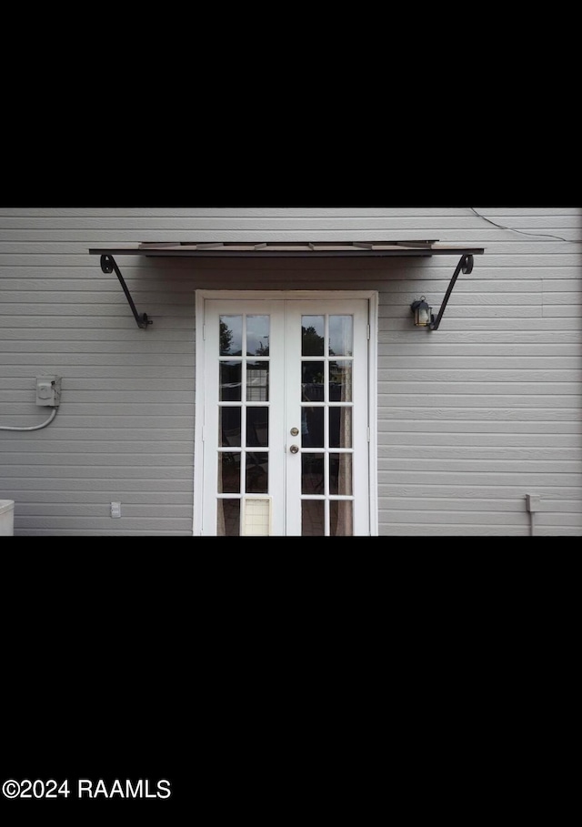 doorway to property with french doors