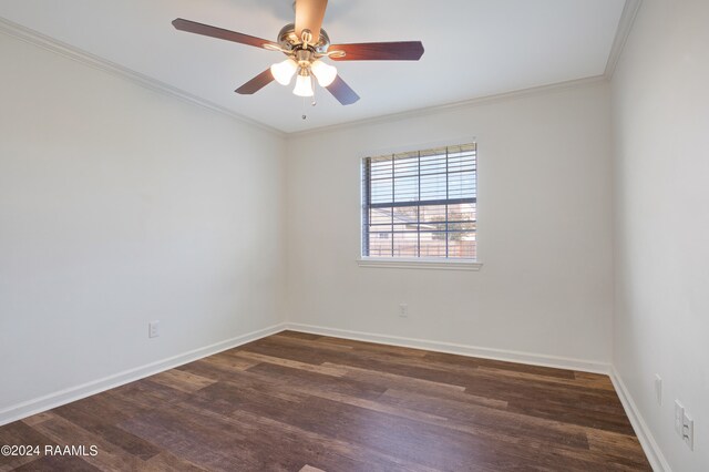 unfurnished room with ornamental molding, ceiling fan, and dark wood-type flooring