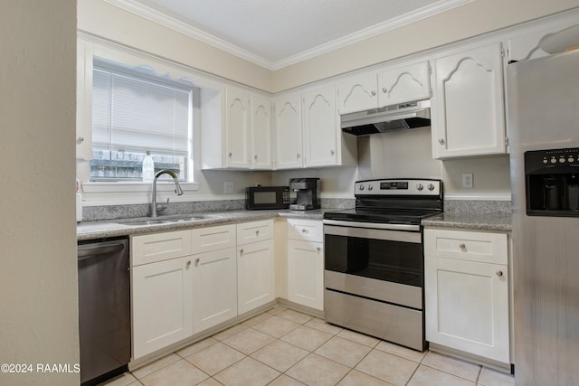 kitchen featuring appliances with stainless steel finishes, crown molding, white cabinetry, and sink