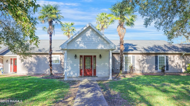 view of front of house with a front lawn