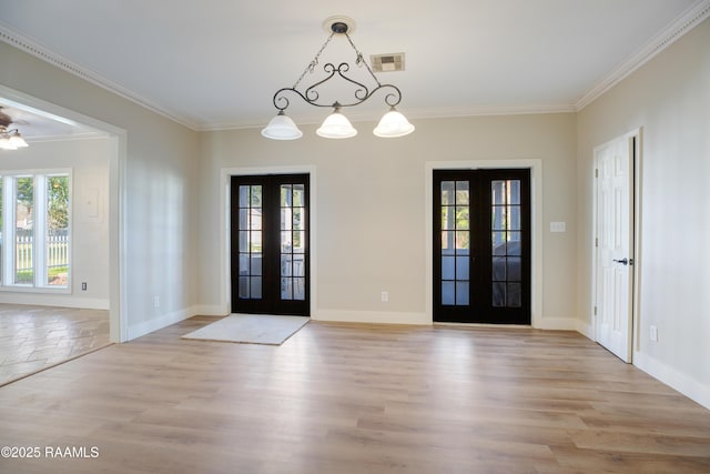 doorway with ceiling fan, french doors, light hardwood / wood-style floors, and ornamental molding