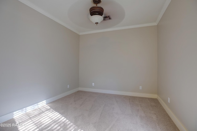 empty room with light colored carpet and ornamental molding