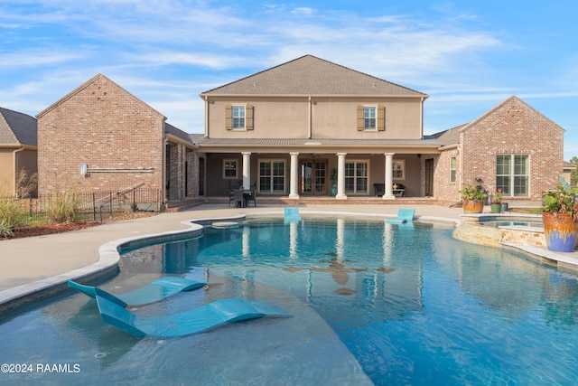 view of pool featuring a patio area