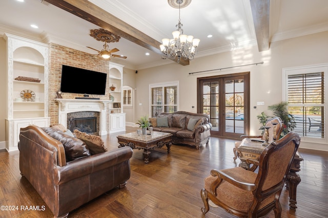 living room with a fireplace, french doors, beamed ceiling, dark hardwood / wood-style floors, and built in shelves