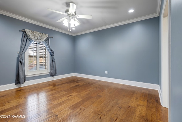 unfurnished room with ornamental molding, wood-type flooring, and ceiling fan