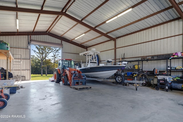 garage featuring wooden walls