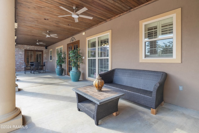 view of patio / terrace featuring an outdoor living space and ceiling fan