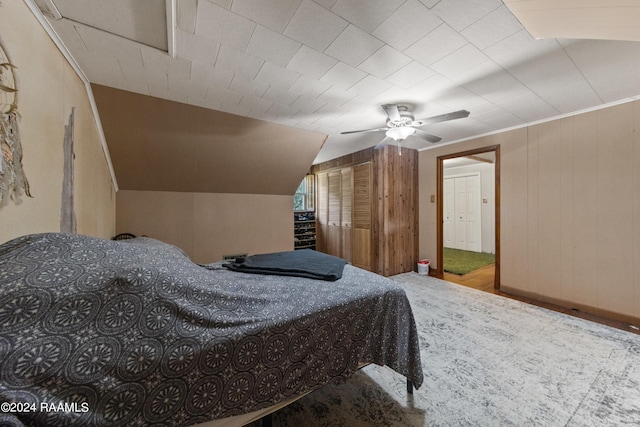 bedroom featuring ceiling fan and lofted ceiling