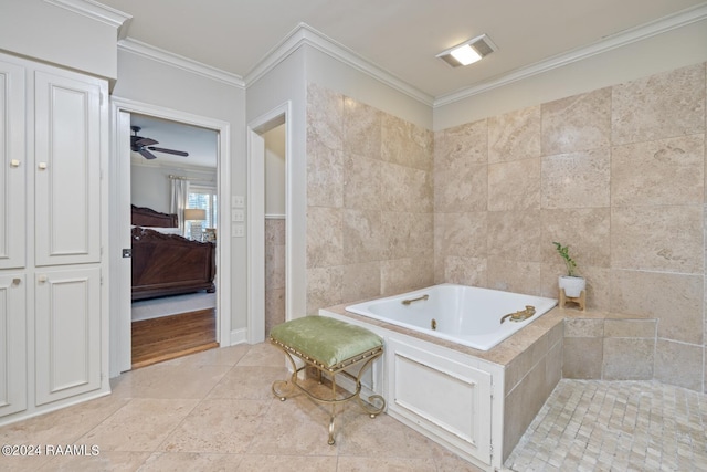201 Canterbury Rd, Lafayette, LA 70508 - ensuite bathroom featuring a garden tub, ornamental molding, tile patterned floors, tile walls, and a ceiling fan