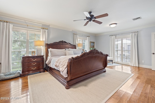 201 Canterbury Rd, Lafayette, LA 70508 - bedroom with light wood-style flooring, crown molding, baseboards, and ceiling fan