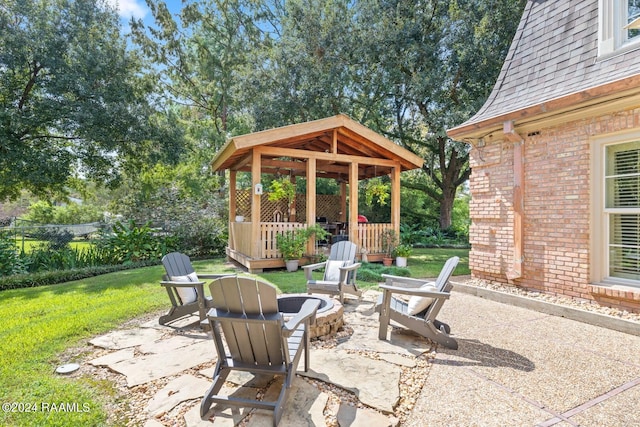 view of patio / terrace with a fire pit