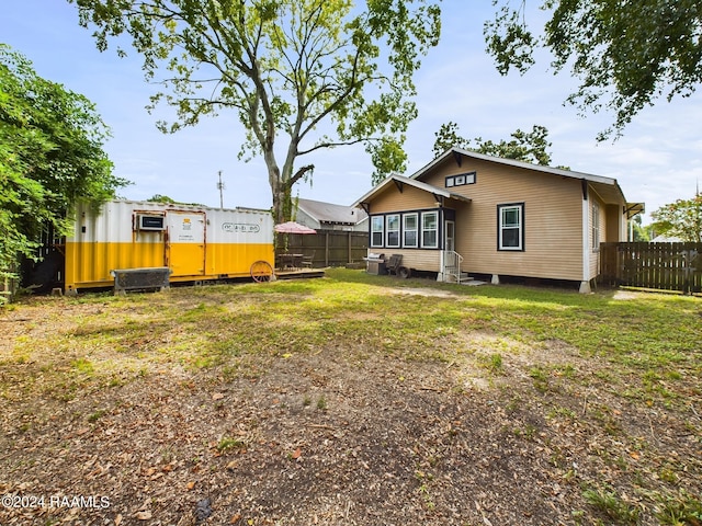 view of yard with a sunroom