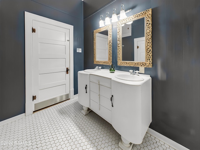 bathroom featuring tile patterned flooring and vanity