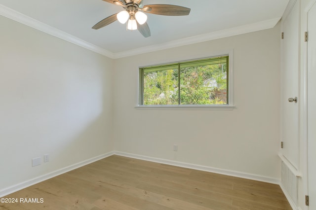 unfurnished room with ornamental molding, ceiling fan, and light hardwood / wood-style flooring