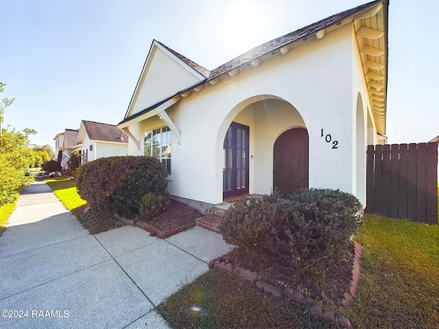 102 Rue Gambetta, Lafayette, LA 70507 - view of front of house featuring stucco siding and french doors