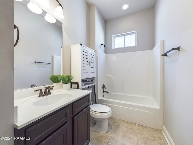 full bathroom featuring washtub / shower combination, vanity, toilet, and tile patterned flooring