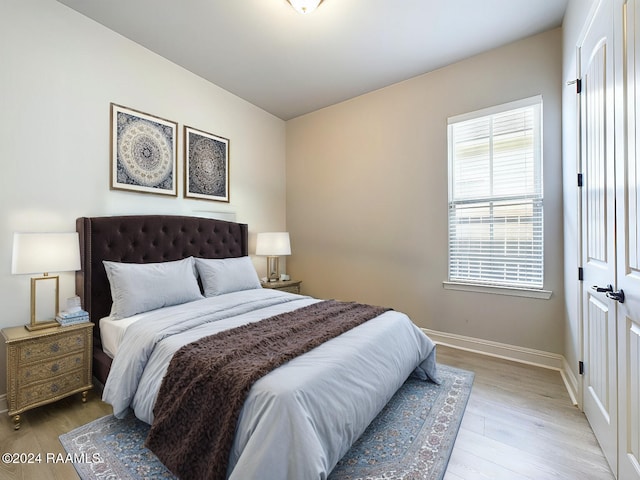 bedroom featuring light hardwood / wood-style floors